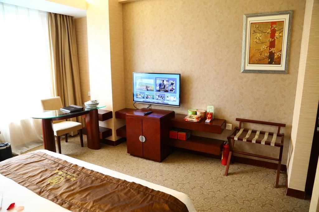 Long Zhou Grand Hotel Cantón Habitación foto