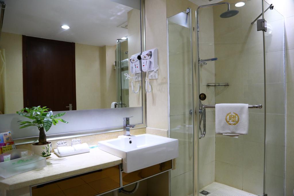 Long Zhou Grand Hotel Cantón Habitación foto