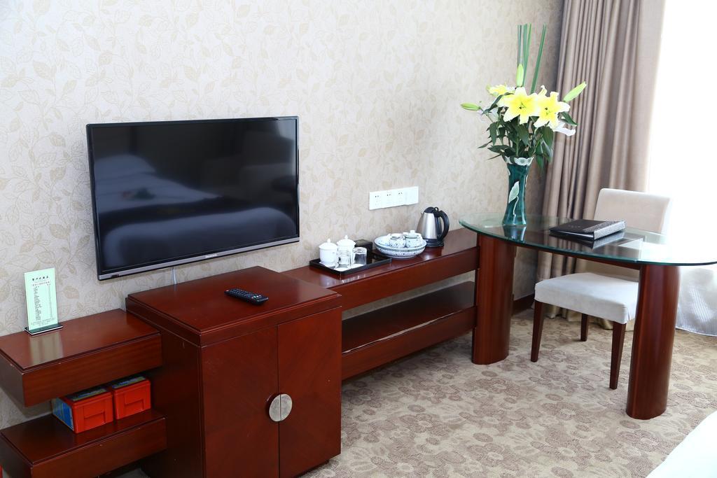 Long Zhou Grand Hotel Cantón Habitación foto