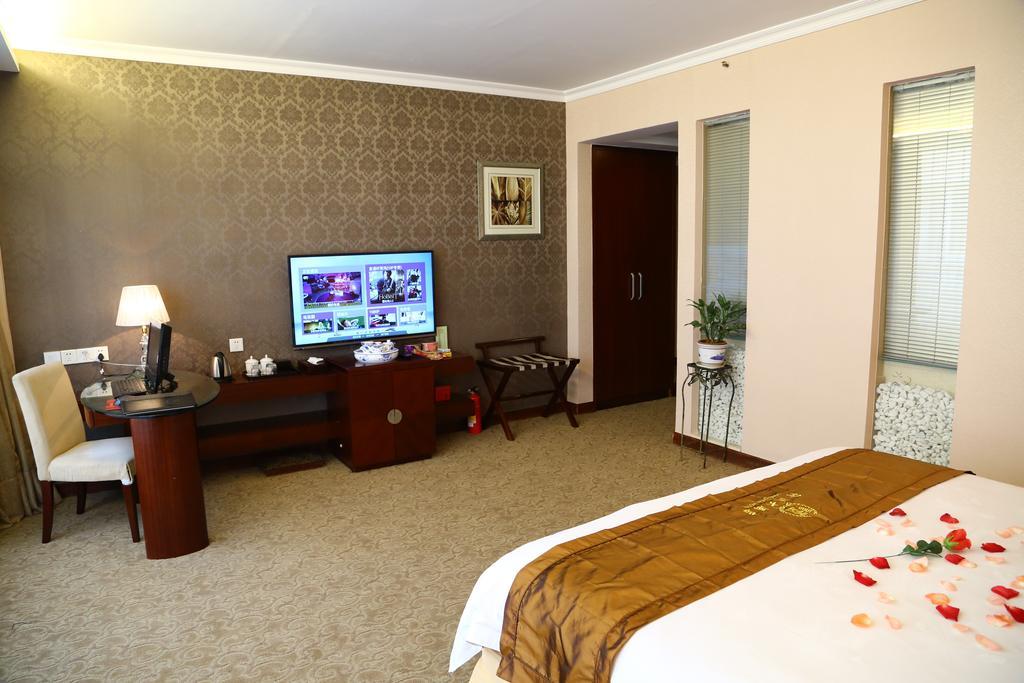 Long Zhou Grand Hotel Cantón Habitación foto