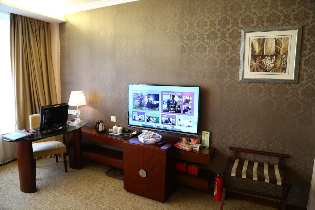 Long Zhou Grand Hotel Cantón Habitación foto